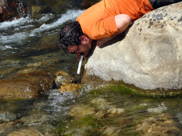 Drinking from a river with the Seychelle Advanced Pure Water Straw