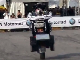 Chris Pfeiffer makes his fully accessorized BMW R1200GS Wheelie.