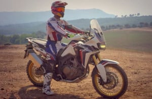 Marc Marquez sitting on new africa twin